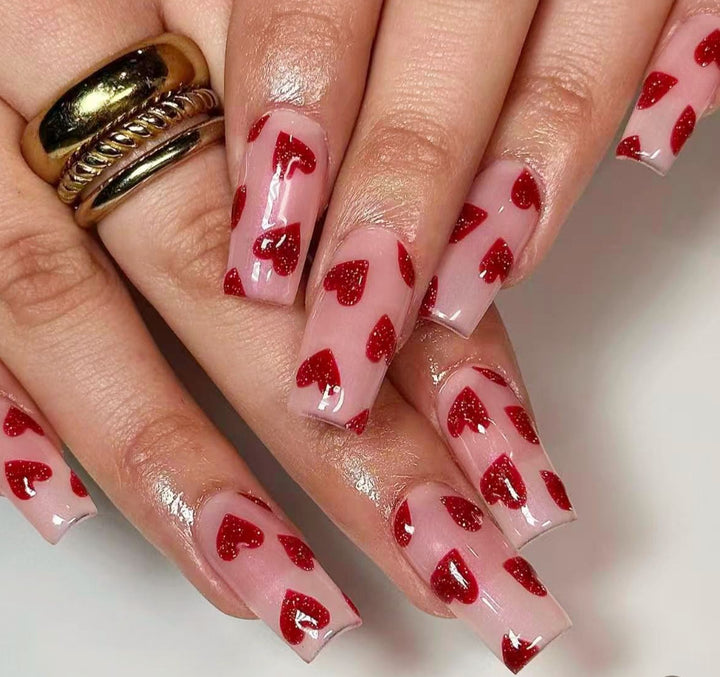 Elegant Heart-Embellished Nail Art Design Stornfield