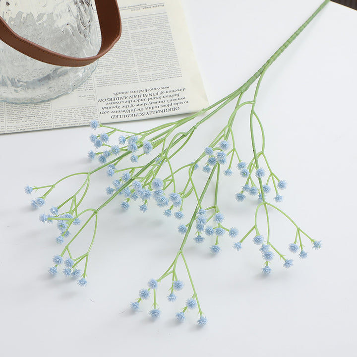 Decorative artificial flower branch with fine purple flowers