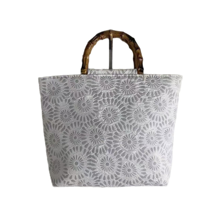 Exclusive and handcrafted beach bag with bamboo handles Stornfield