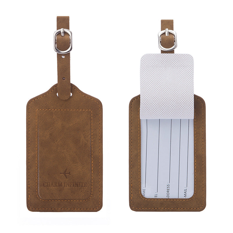 vintage leather luggage tag with transparent ID window and adjustable buckle strap Stornfield