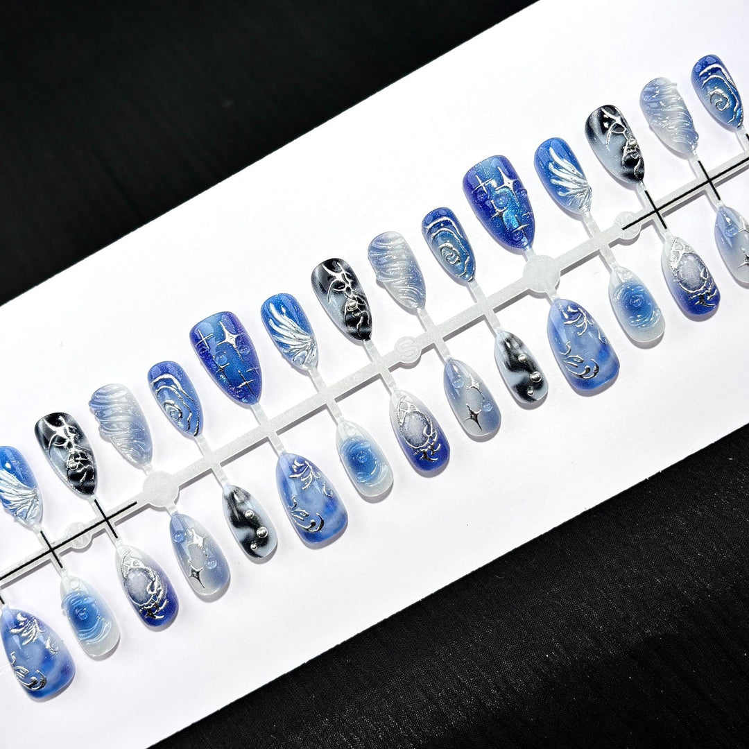 Artistic Press-On Nail Art Set with Elegant Blue Designs