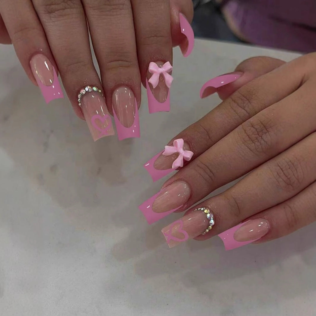 Artificial nail set with romantic bows and heart patterns Stornfield