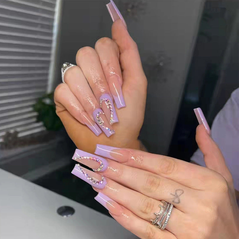 Nail art set with sparkling hearts and elegant glitter accents Stornfield