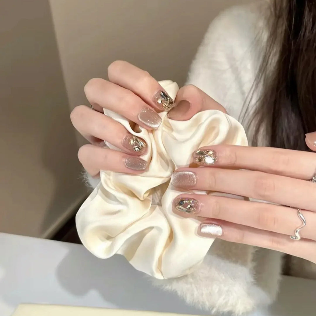 Elegant artificial nails with sparkling gold accents Stornfield