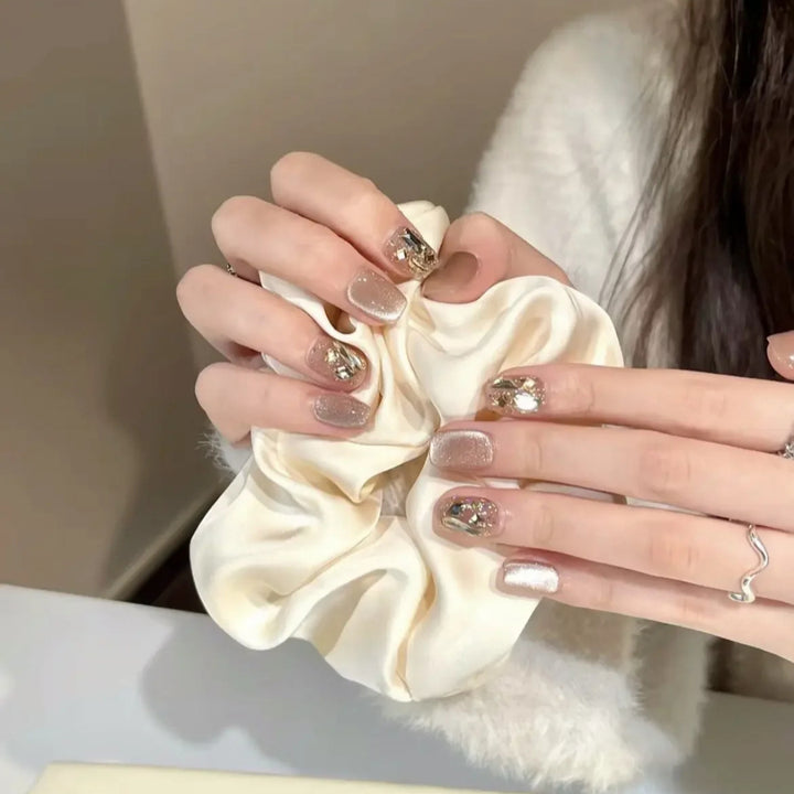 Elegant artificial nails with sparkling gold accents Stornfield