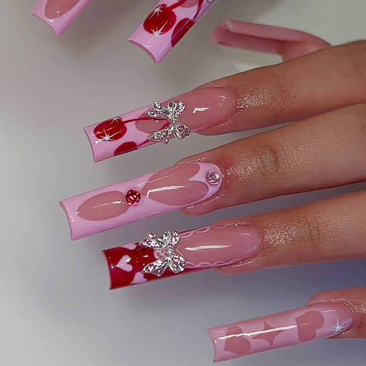 Creative nail art set with glitter and heart designs Stornfield