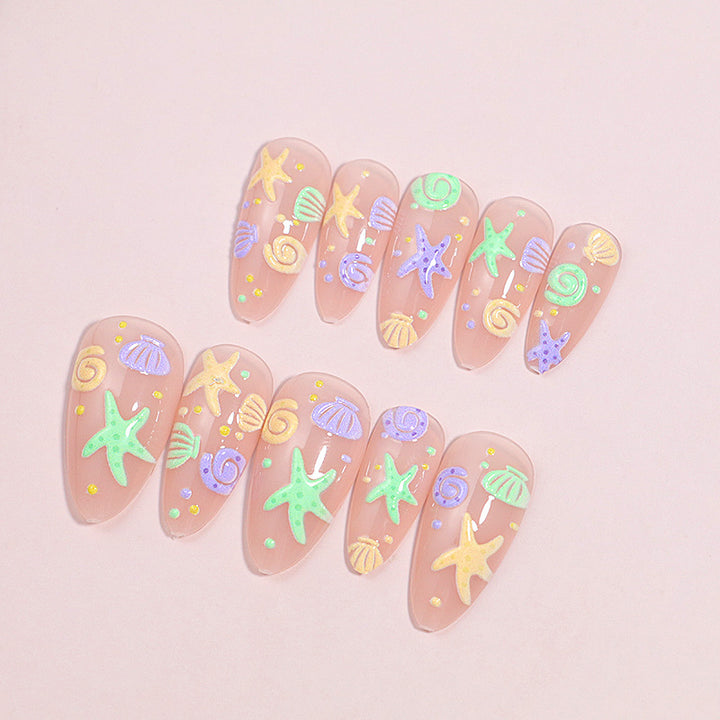 Artistic Press-On Nail Design with Ocean-Inspired Accents Stornfield