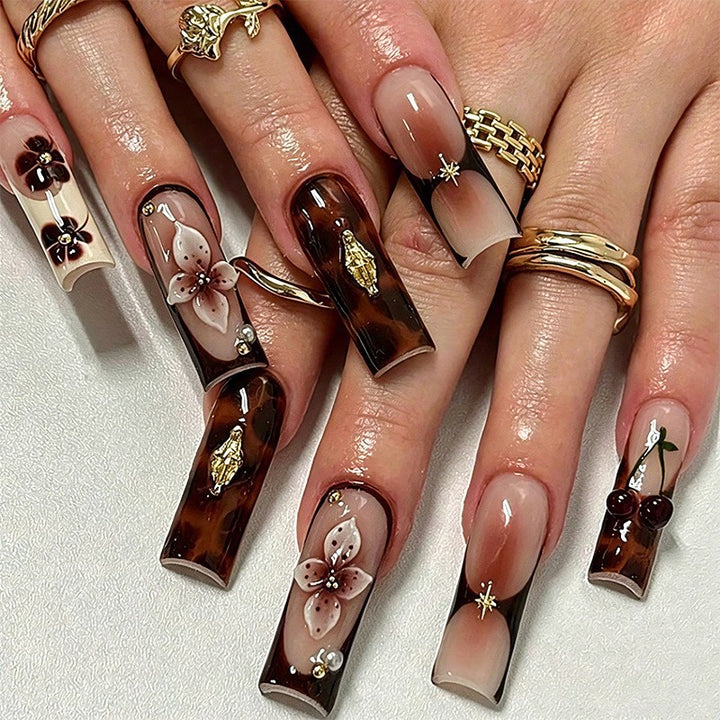 Artistic Nail Tips with Autumn Motifs Stornfield