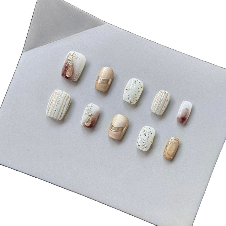 Elegant Decorative Press-On Nail Set with Gold and Marble Accents