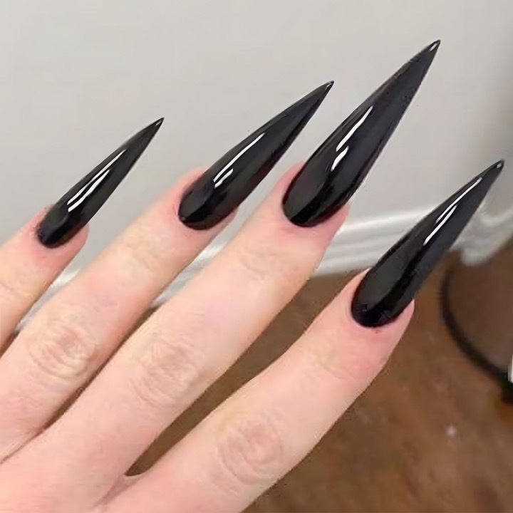 Acrylic nail set with elegant stiletto design Stornfield