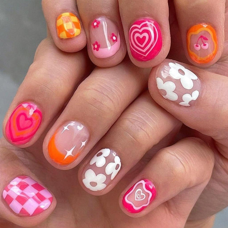 Nail art set with playful-romantic designs Stornfield