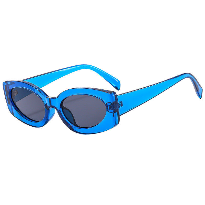 Ladies trendy sunglasses with unique, curved frame Stornfield