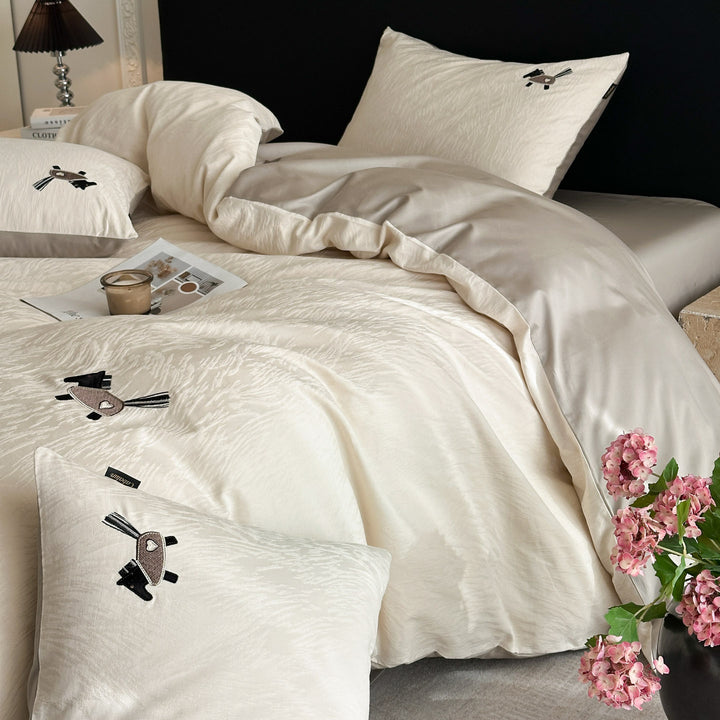 Bedding set in linen look with delicate flower embroidery