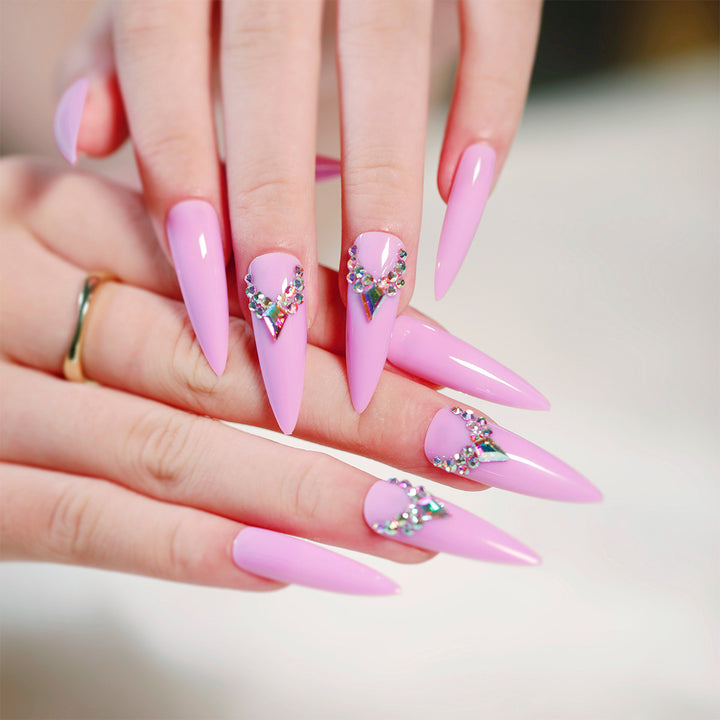Glamorous stiletto nails with rhinestone decoration Stornfield