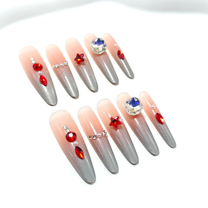 Sparkling artificial nails with decorative rhinestones Stornfield