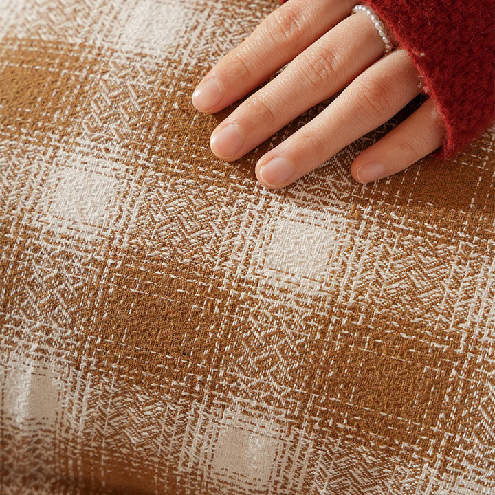 Decorative square cushion cover with pompom corners and checkered jacquard pattern Stornfield