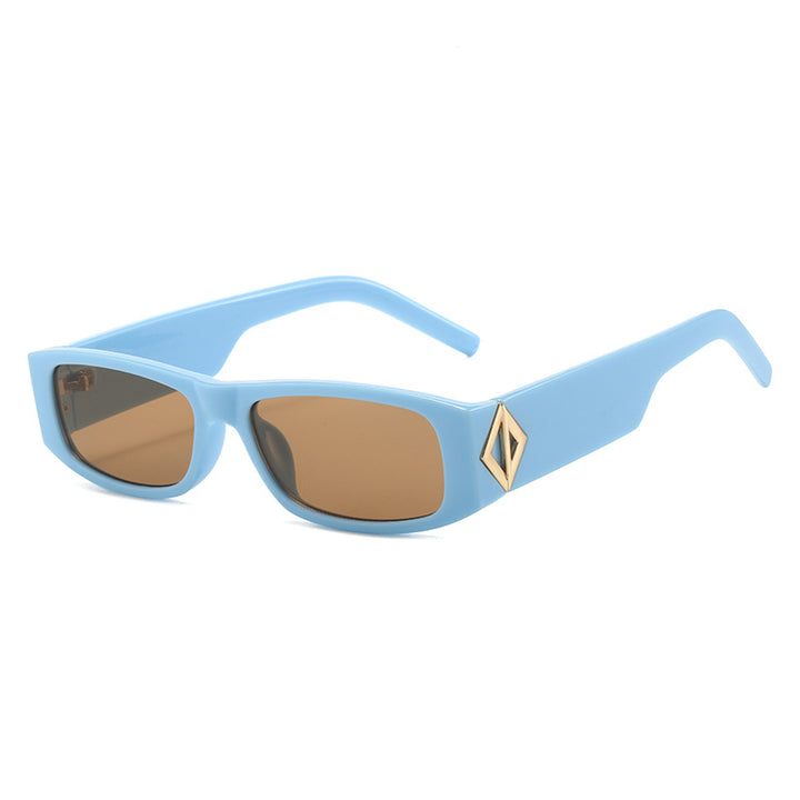 Ladies fashionable sunglasses with asymmetrical frame and gold-colored details Stornfield