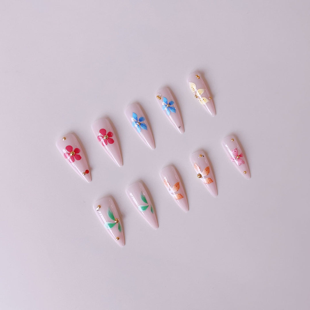 Artificial nail tips with floral decorations Stornfield