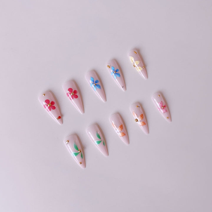 Artificial nail tips with floral decorations Stornfield