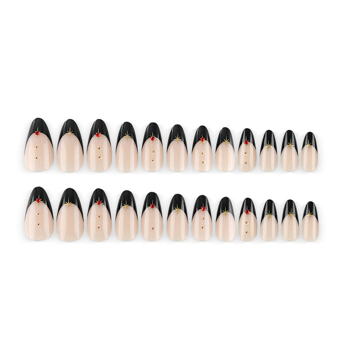 Glamorous artificial nails in stylish stiletto design with golden accents Stornfield