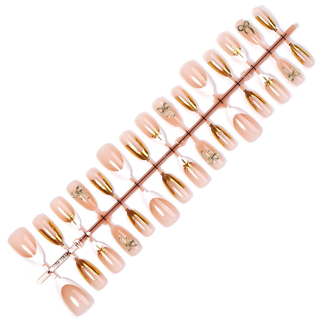 Artificial nail set with glamorous 3D details and elegant gold accents Stornfield