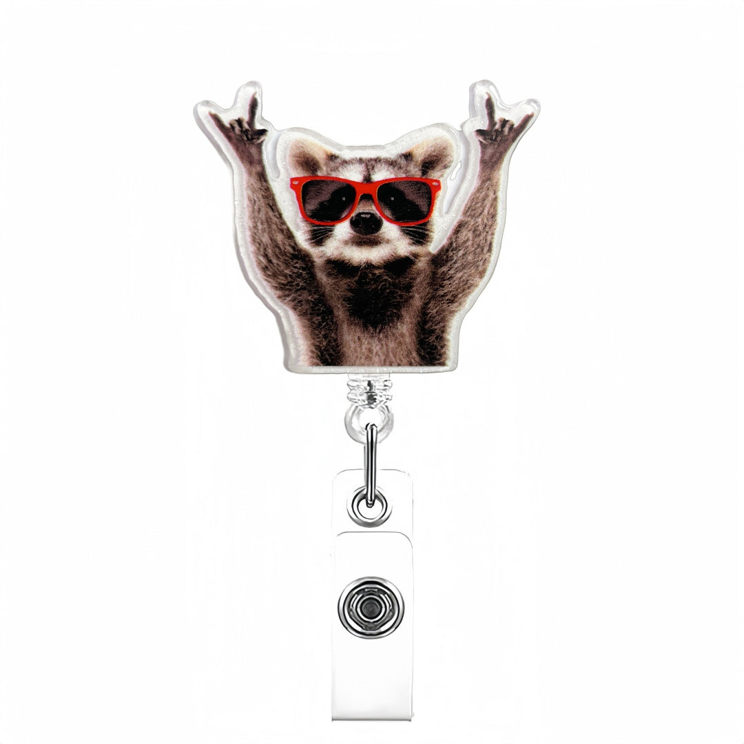 Expandable badge holder with anatomical heart pendant