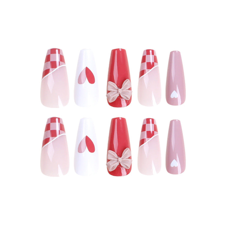 Artful nail extensions with playful designs and romantic accents Stornfield