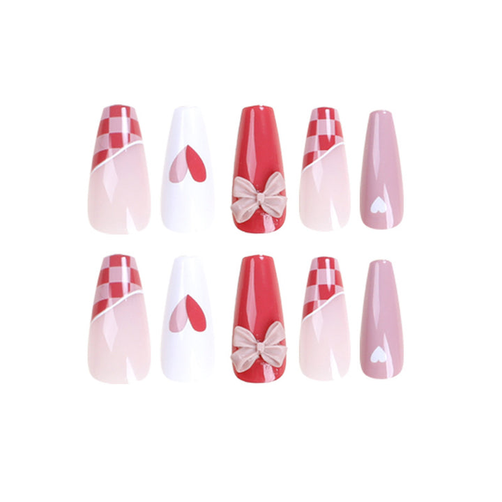 Artful nail extensions with playful designs and romantic accents Stornfield