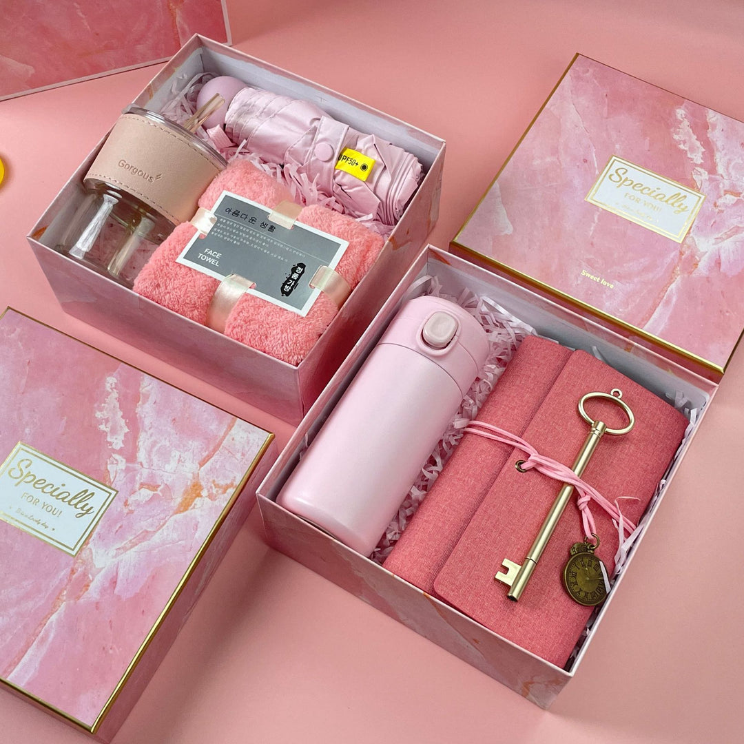 Unisex multifunctional gift box with a portable fan, a glass mug, and a towel from Stornfield