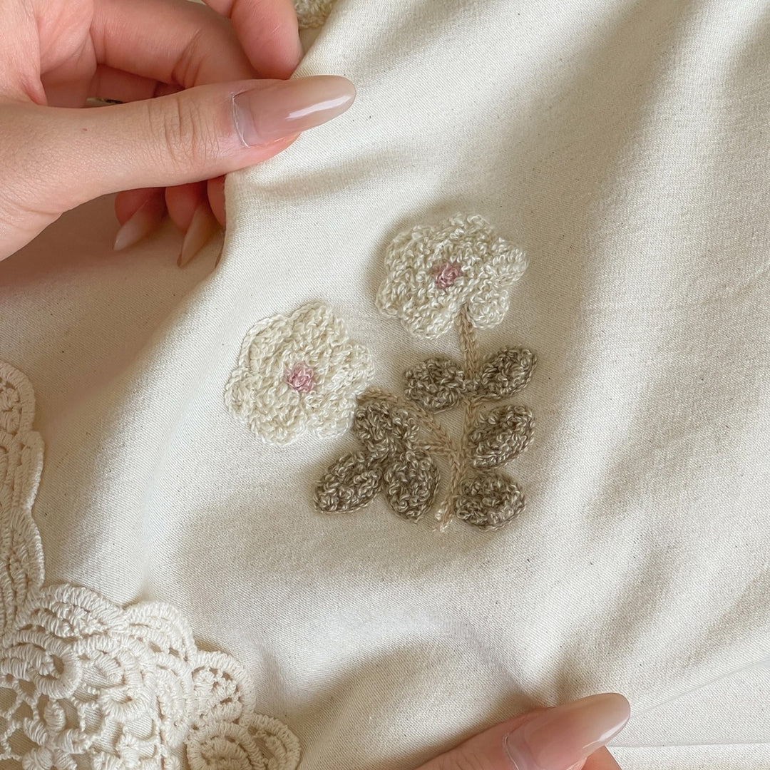 Embroidered cotton satin bedding set with lace trim