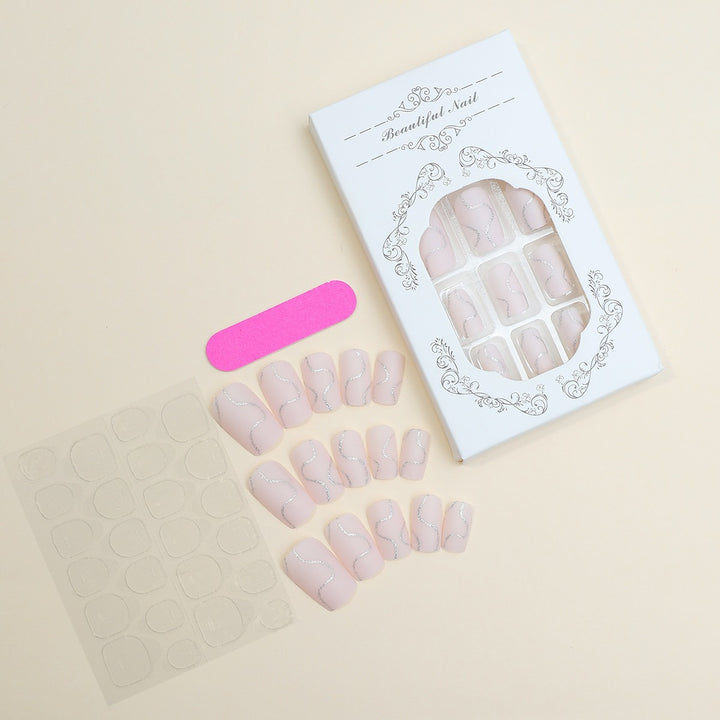 Artificial nail set with elegant lines and glitter accents Stornfield