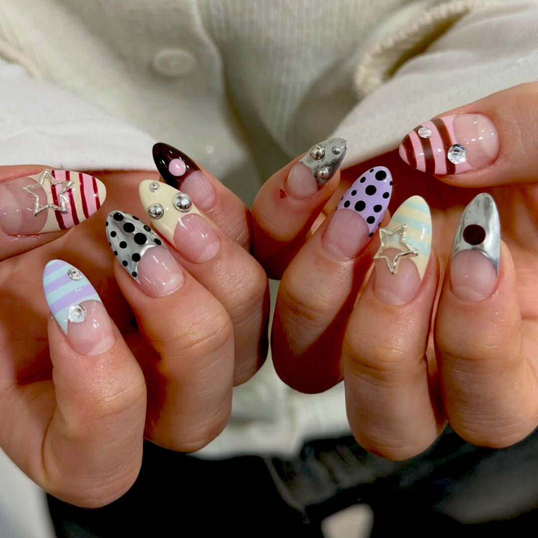 Artificial nails with creative patterns and 3D accents Stornfield