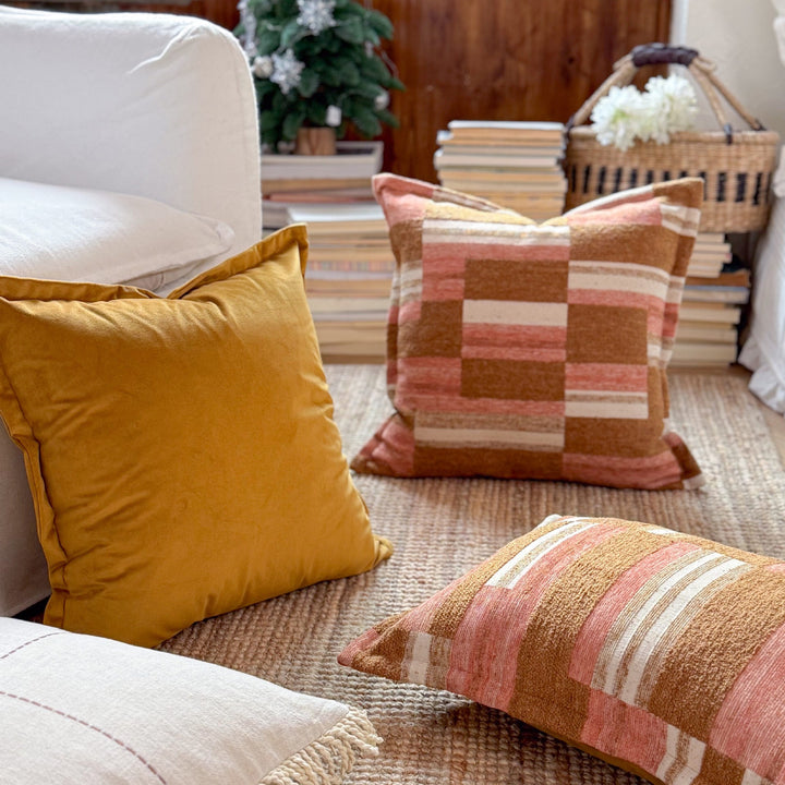 Decorative cushion made of linen look with hand-tied fringes and cross-stitch detail