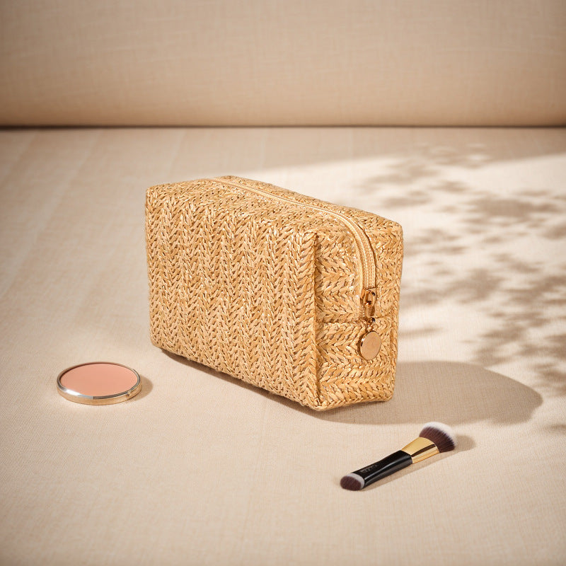 Cosmetic bag made of natural rafia material with elegant design Stornfield