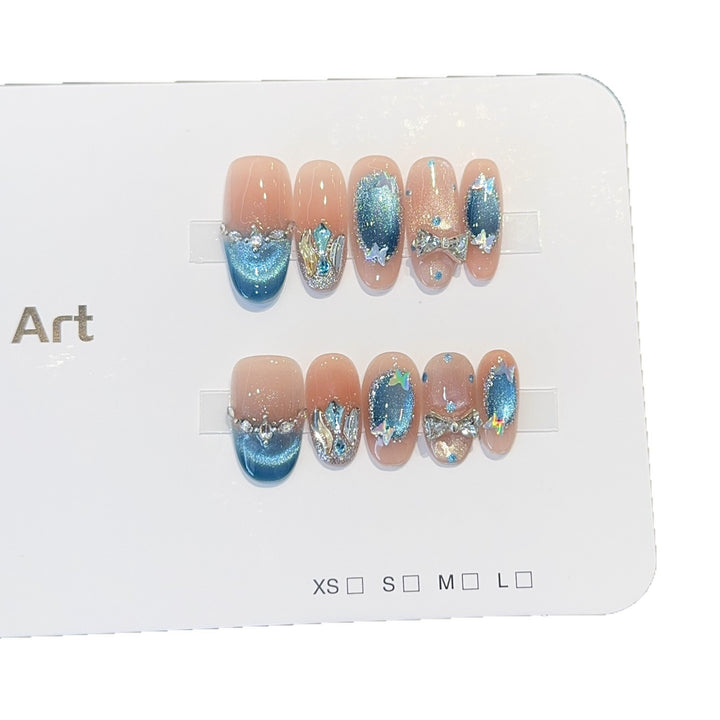 Artificial nail tips with glitter and watercolor effect Stornfield
