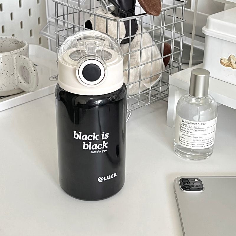 Women's insulated drinking bottle with innovative flip lid and practical handle Stornfield