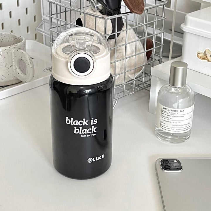 Women's insulated drinking bottle with innovative flip lid and practical handle Stornfield