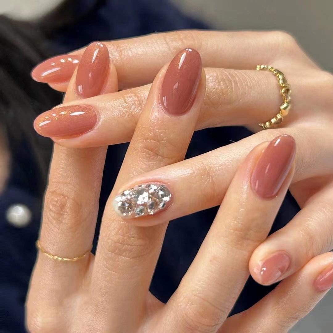 Artistic acrylic nails with glitter accents Stornfield