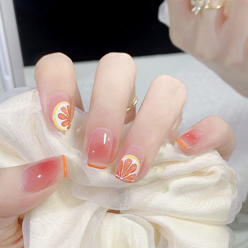 Glamorous artificial nails with delicate flower and glitter effects Stornfield