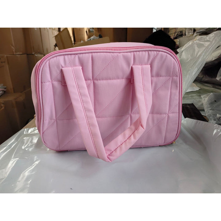 Cosmetic bag with padded interior compartment Stornfield