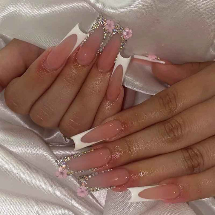Art nail set with elegant glitter and floral accents Stornfield