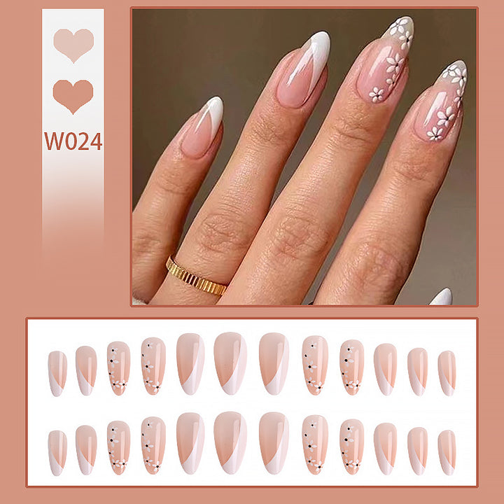 Artistic Nail Tips with Floral Accents Stornfield