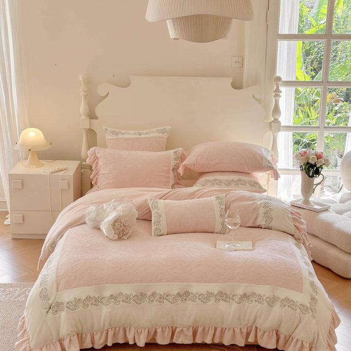 Quilted cotton duvet cover set with ruffle, embroidery border, and decorative quilted texture