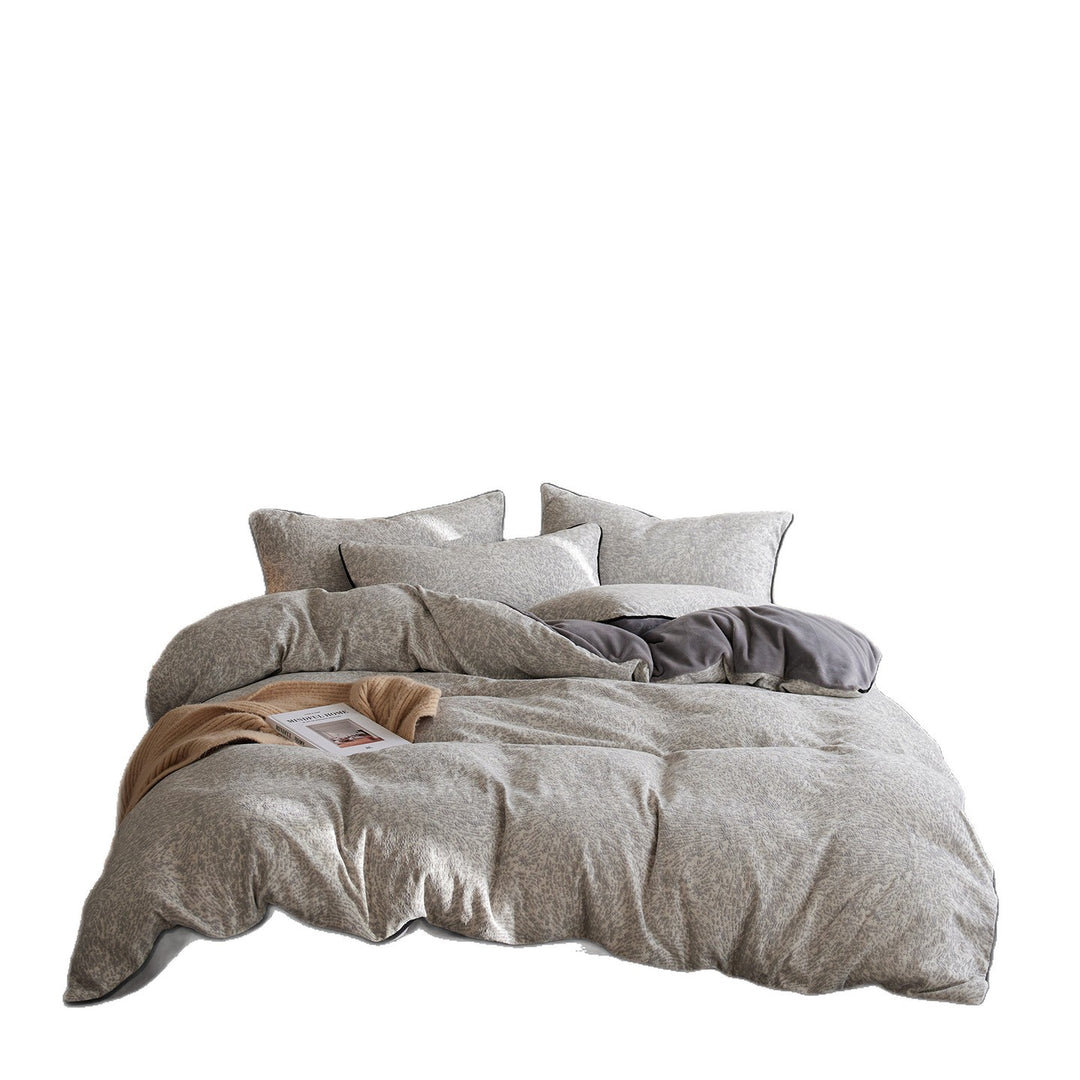 Premium bedding set made of breathable cotton blend with contrast piping