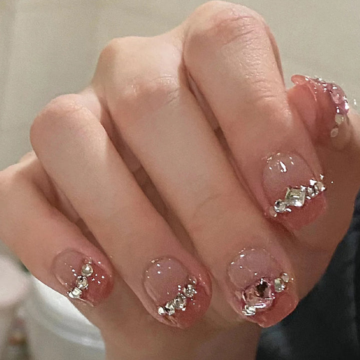 Glamorous nail art with rhinestone details Stornfield