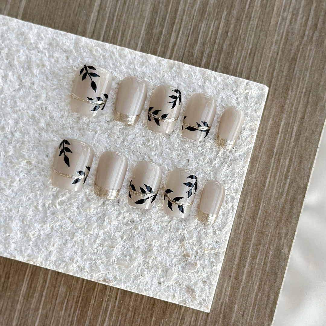 Artistic Press-On Nail Set with Floral Accents