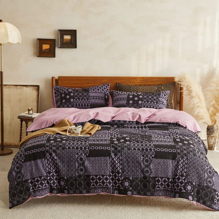 Patchwork bedding set made of cotton blend with reversible function and light quilting