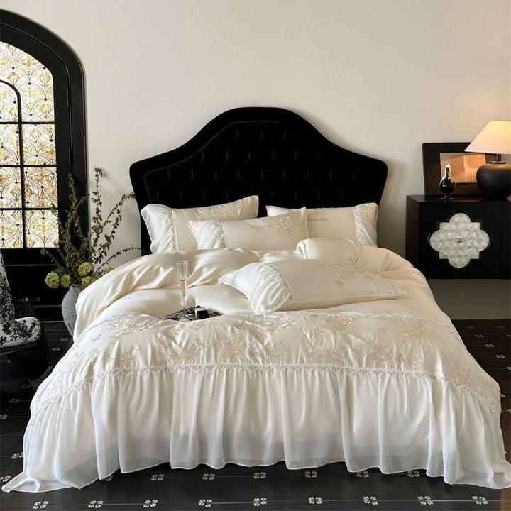 Luxurious satin bedding set with embroidered butterfly and flower appliqués