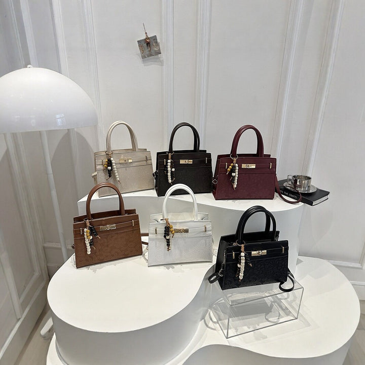 Elegant Embossed Handheld Satchel