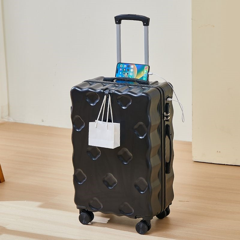 hard-shell carry-on suitcase with integrated foldable cup holder phone cradle USB charging port and external bag hooks Stornfield